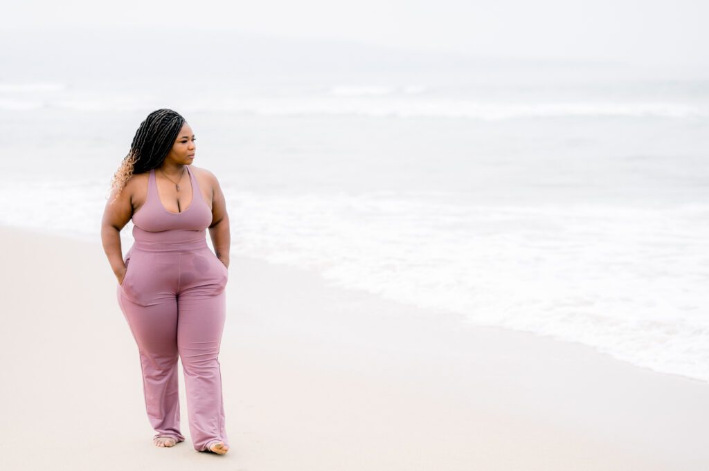 Image - Lady walking on a beach - calm